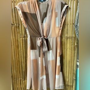 Eva Franco dress/ large. Peach, brown cream. Unique front bow.